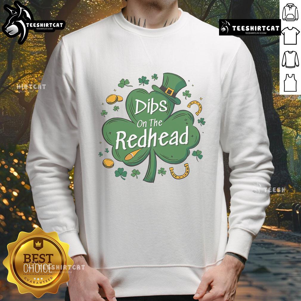 Funny Irish St. Patrick's Day sweatshirt featuring 'Dibs on the Redhead' design with clovers, perfect for festive celebrations.