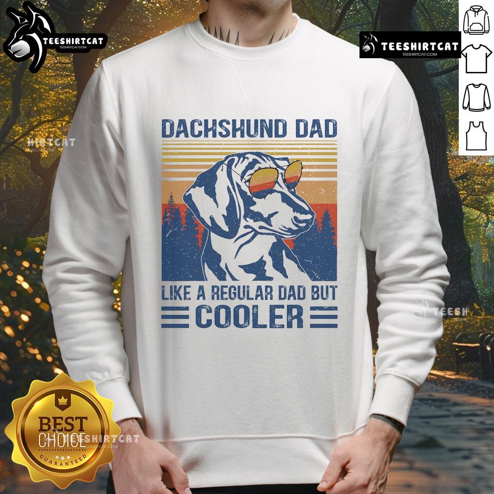 Alt Text: Funny vintage dachshund sweatshirt featuring Dad like a regular dad but cooler text, perfect for dog lovers.