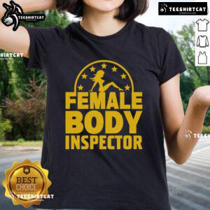 Alt Text: Good Kash Patel wearing a women's body inspector tee, showcasing a stylish and humorous design for ladies.