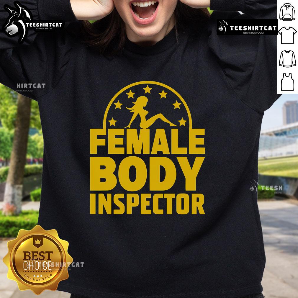 Alt Text: Good Kash Patel wearing a Female Body Inspector sweatshirt, showcasing a fun and humorous design for casual wear.