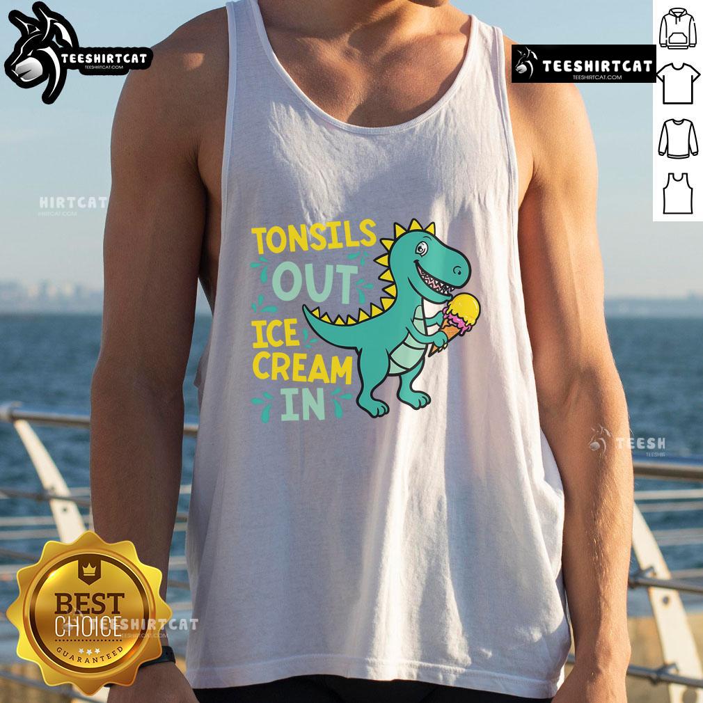 Child in a dino tank top enjoying ice cream after tonsil removal, showcasing a fun recovery moment.