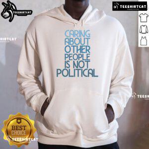 Hot Caring About Other People Is Not Political Hoodie in vibrant colors, promoting compassion and kindness for all.