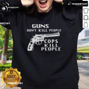 Hot Guns Don't Kill People Cops Kill People sweatshirt featuring bold text design, perfect for statement fashion.