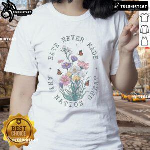 Floral anti-Trump tee with butterflies, showcasing 'Hot Hate Never Made Any Nation Great' for liberal women.