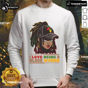 Black woman wearing 'Hot, I Love Being A Black Woman' sweatshirt celebrating Black History Month with pride.