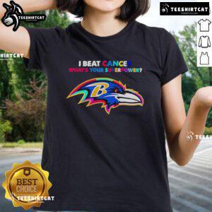 Alt Text: Baltimore Ravens ladies tee featuring I Beat Cancer, What's Your Superpower? slogan, perfect for cancer awareness support.