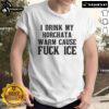 Alt Text: Official 'I Drink My Horchata Warm Cause F* Ice' Deportation Protest T-Shirt showcasing bold, colorful design.