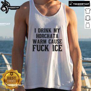 Protest tank top with 'I Drink My Horchata Warm Cause F* Ice' slogan, promoting immigration rights and cultural pride.