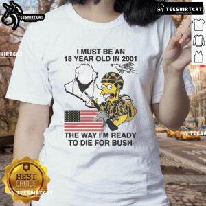 Alt Text: The Simpsons Bush Ladies Tee featuring 'I Must Be An 18-Year-Old In 2001' design, perfect for fans of political satire.