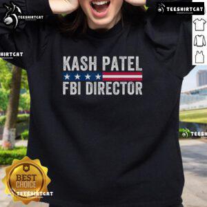 Kash Patel wearing a patriotic American flag sweatshirt, promoting his campaign for FBI Director.