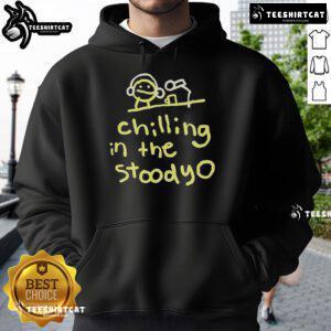 Official Mummy Joe chilling in the studio wearing a stylish hoodie, showcasing a relaxed vibe and creative atmosphere.