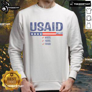 Premium USAID Waste Abuse Fraud Since 1961 sweatshirt featuring bold text and a stylish design for casual wear.