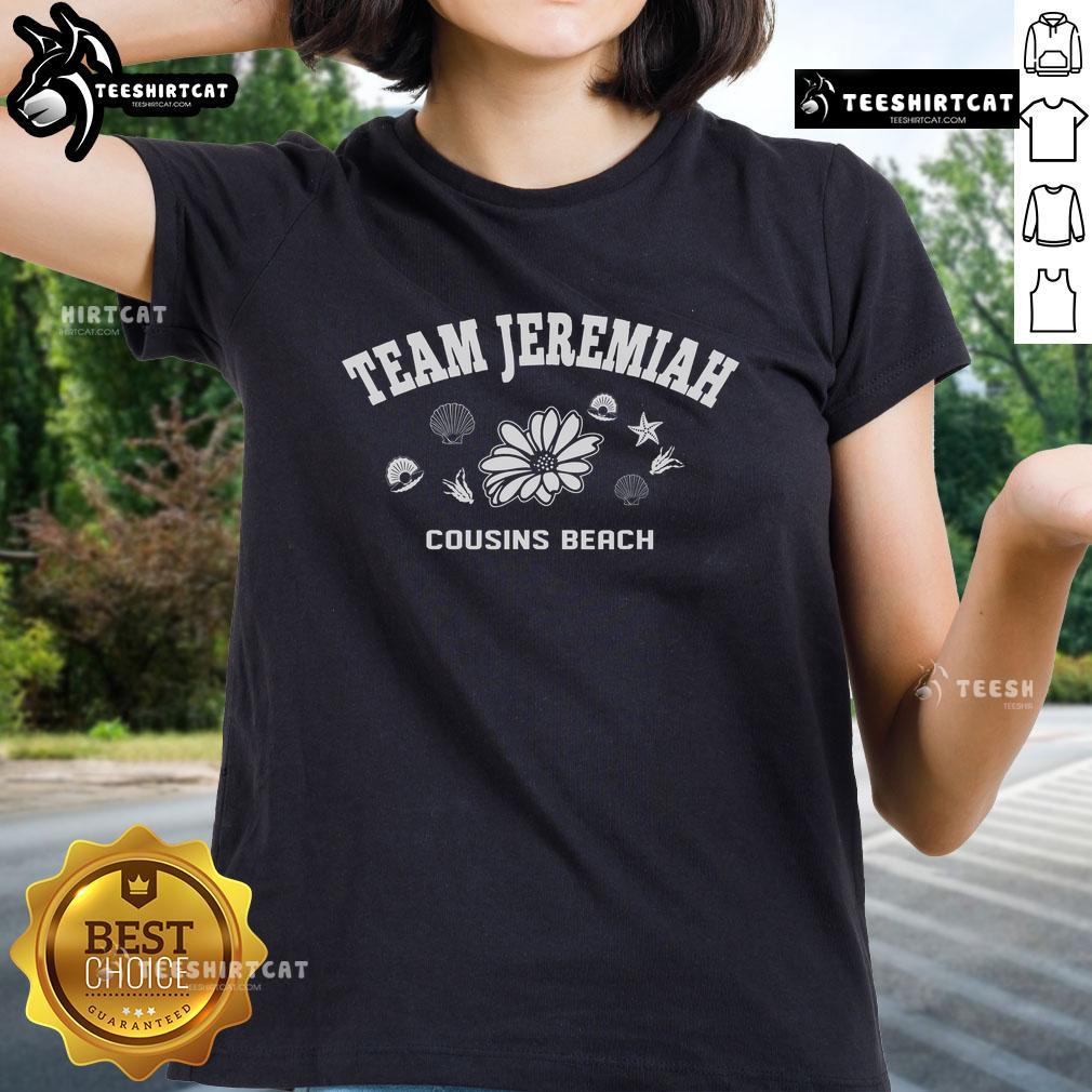 Pretty team wearing 'The Summer I Turned Pretty' ladies tee at the beach, showcasing summer vibes and stylish fashion.