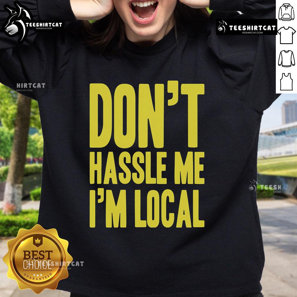 Cozy Top-Dont-Hassle-Me-Im-Local sweatshirt displayed on a hanger, perfect for casual wear and showcasing local pride.
