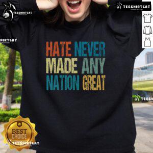 Anti-Trump 2025 sweatshirt featuring 'Top Hate Never Made Any Nation Great' slogan in bold letters.