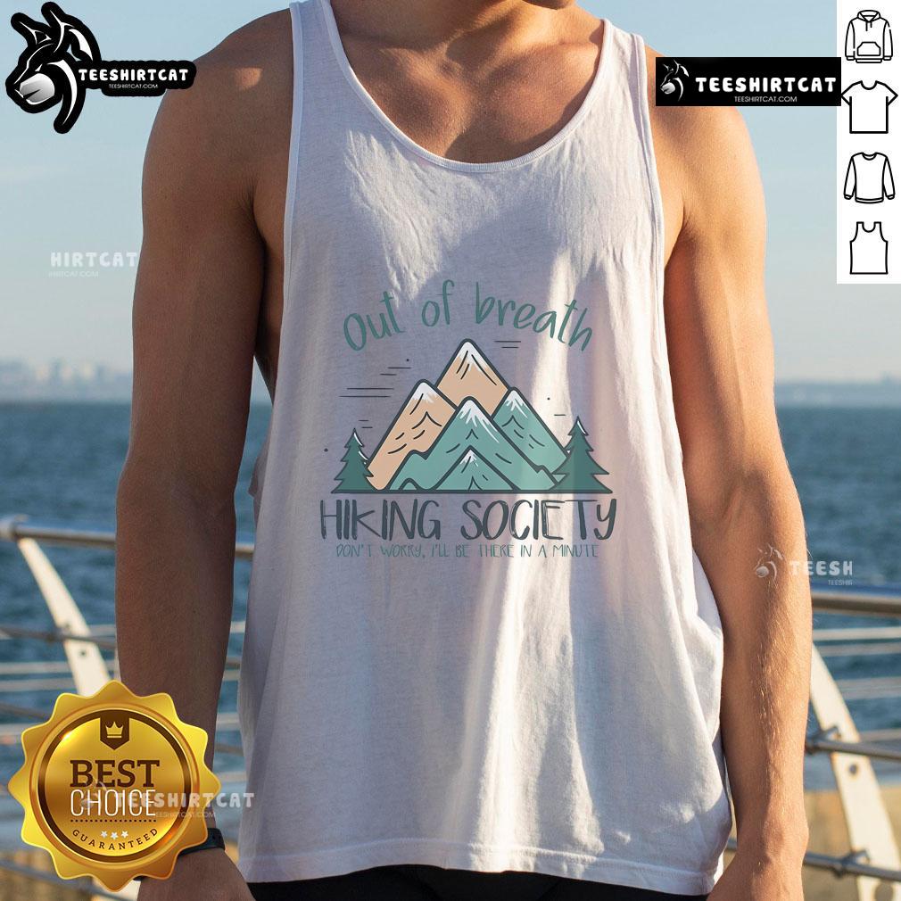 Top Out Of Breath Hiking Society hiker tank top worn by an enthusiastic hiker on a scenic trail adventure.