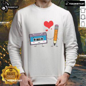 Cute cassette tape pencil design on a retro vintage sweatshirt, celebrating 70s, 80s, and 90s music culture.