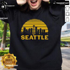 Vintage Seattle Washington cityscape sweatshirt featuring iconic skyline and colorful design, perfect for city lovers.