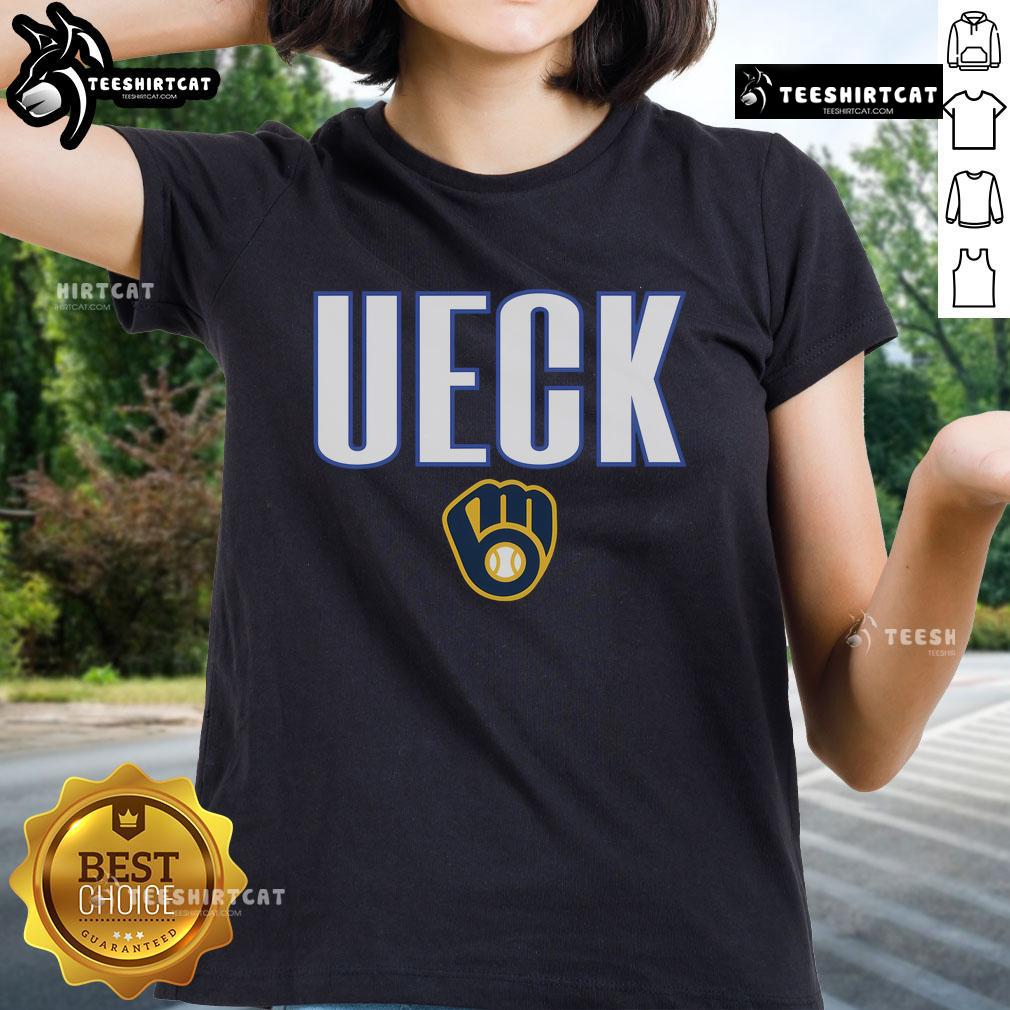 Front row view of Bob Uecker, the Mr. Baseball legend, wearing a stylish ladies' tee at a baseball game.