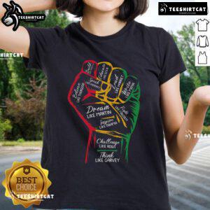 Empowering black leaders graphic on a ladies' tee for Black History Month featuring a raised power fist design.
