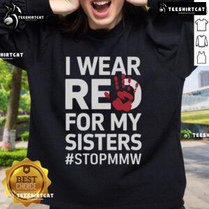 Red sweatshirt with 'I Wear Red For My Sisters' honoring missing and murdered Indigenous women, symbolizing awareness and support.