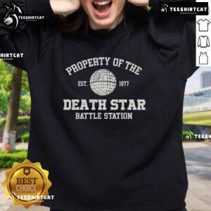 Stylish sweatshirt featuring the iconic Death Star battle station, established 1977, perfect for Star Wars fans.