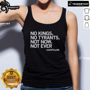 Chris Kluwe wearing a purple tank top with 'No Kings, No Tyrants, Not Now, Not Ever' slogan for activism.