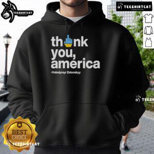 Volodymyr Zelensky wearing a 'Thank You America' hoodie, showcasing support and gratitude towards the U.S.