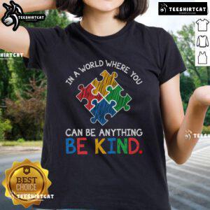 Pretty in a World Where You Can Be Anything, Be Kind Autism Awareness Ladies Tee showcasing a vibrant design promoting kindness.