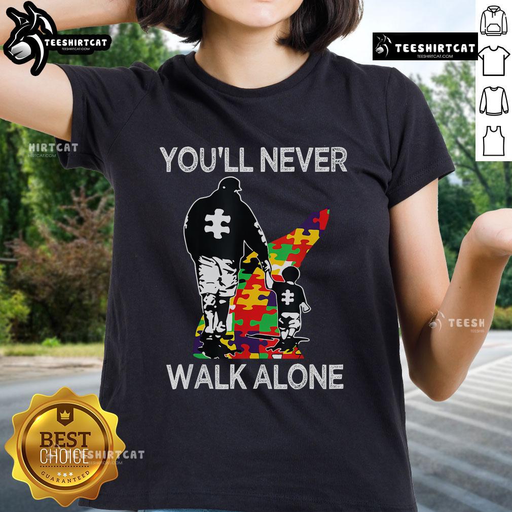 Top Autism Dad Support Alone Puzzle Tee featuring the phrase 'You'll Never Walk Alone' for proud dads of children with autism.