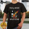 Top Autism Dad Support Alone Puzzle You'll Never Walk T-Shirt featuring a colorful puzzle design and inspiring message.