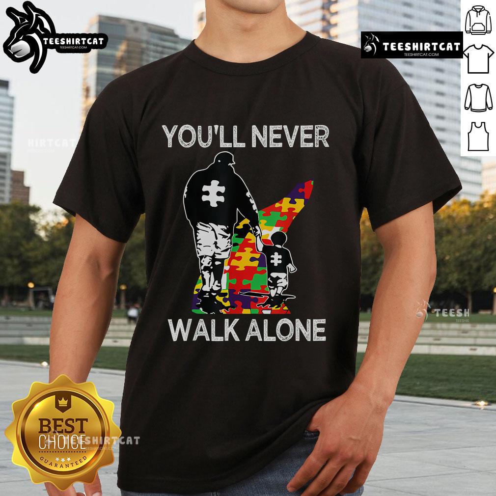 Top Autism Dad Support Alone Puzzle You'll Never Walk T-Shirt featuring a colorful puzzle design and inspiring message.