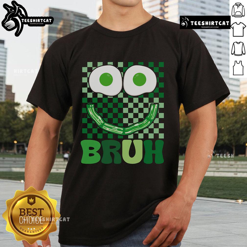 Alt Text: Funny St Patrick's Day T-shirt featuring green face with eggs and bacon, perfect for a festive breakfast celebration.