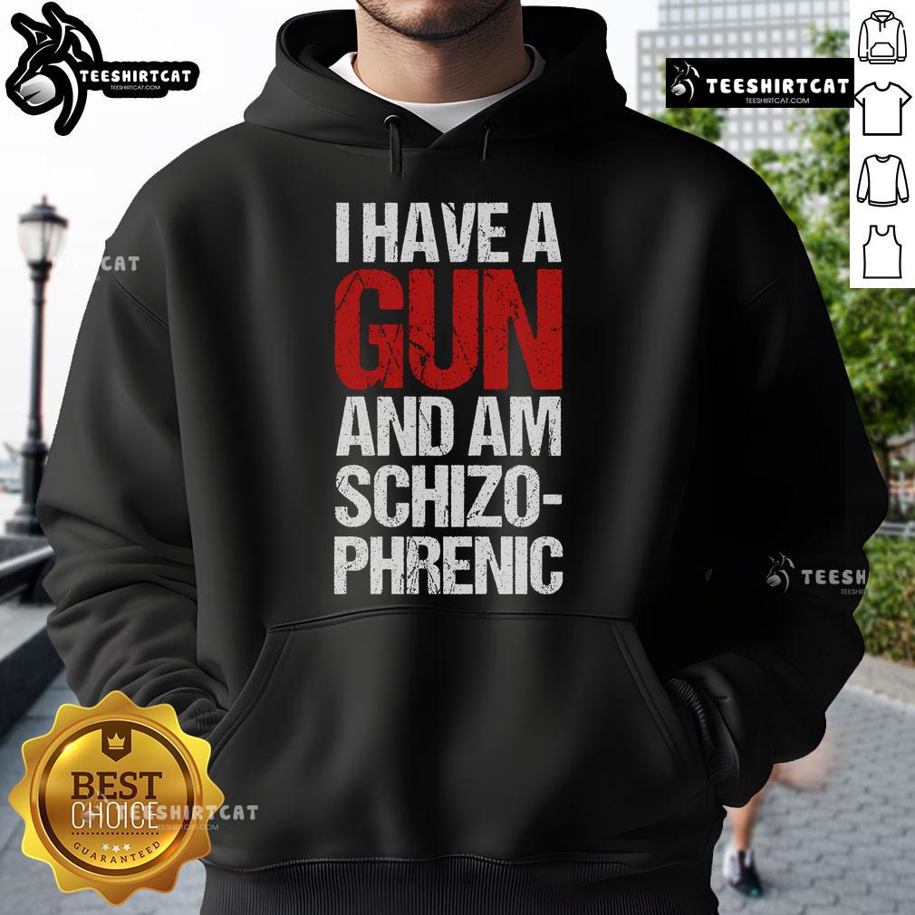 Top I Have A Gun And Am Schizophrenic hoodie featuring bold graphic design and eye-catching colors for streetwear style.