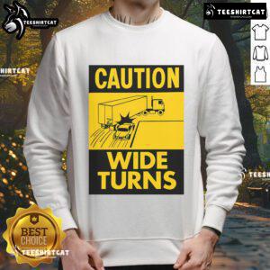 Funny caution sweatshirt for truckers featuring 'Wide Turns' warning, perfect for safety and humor on the road.