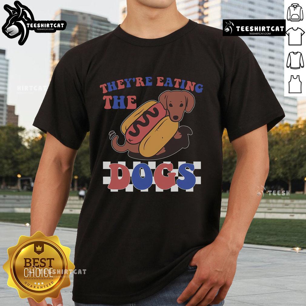 Funny They're Eating The Dogs Independence Day T-Shirt featuring a humorous design for July 4th celebrations.