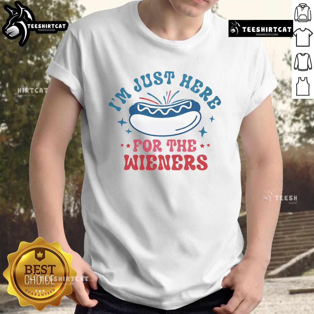 Alt Text: Funny 'Good I'm Just Here For The Wieners' T-Shirt featuring playful text design, perfect for casual outings or BBQs.