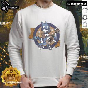 Man wearing Good Jammin' Out Harley Ambertail Games sweatshirt, enjoying a vibrant outdoor atmosphere.