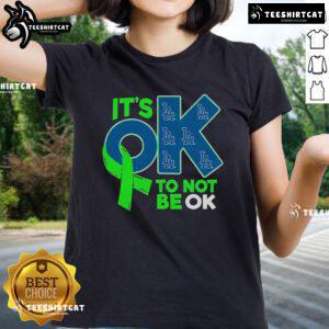 Los Angeles Dodgers women's tee featuring 'It's OK to Not Be OK' slogan, perfect for fans seeking comfort and style.