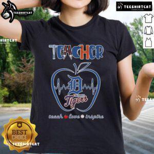 Detroit Tigers teacher tee featuring 'Teach, Love, Inspire' design with apple graphic for dedicated educators and fans.