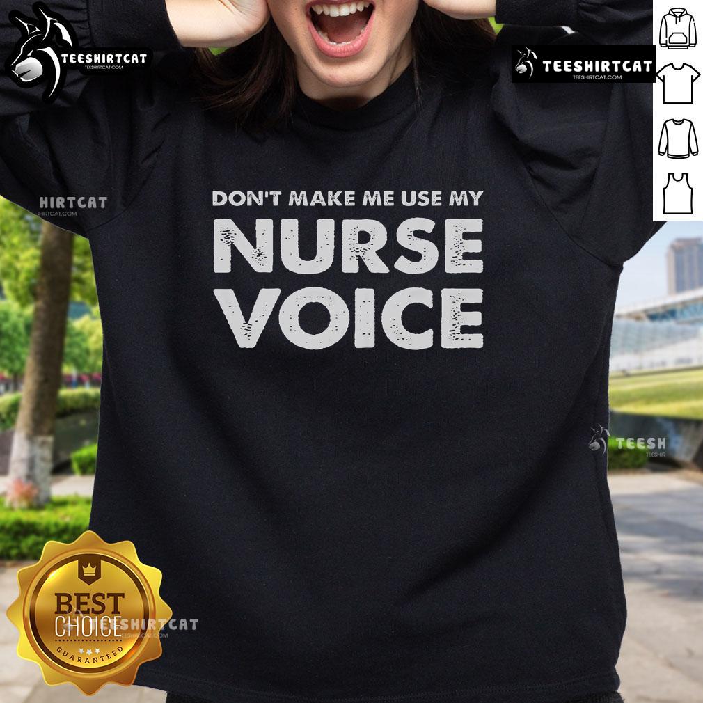 Cozy 'Don't Make Me Use My Nurse Voice' sweatshirt, perfect for nurses showcasing humor and style in healthcare.
