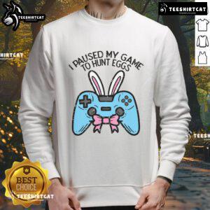 Cozy 'I Paused My Game to Hunt Eggs' sweatshirt for gamers celebrating Easter, perfect for game lovers.