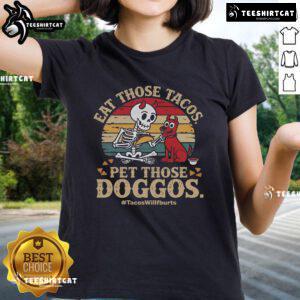 Skeleton dog graphic on a ladies tee featuring 'Nice Eat Those Tacos Pet Those Doggos' slogan - perfect for taco lovers!