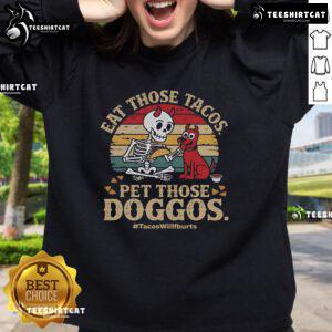 Cute skeleton dog sweatshirt featuring 'Nice Eat Those Tacos, Pet Those Doggos' design, perfect for taco lovers.