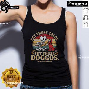 Skeleton dog wearing a tank top that says 'Nice Eat Those Tacos Pet Those Doggos' at Tacos Willburts.
