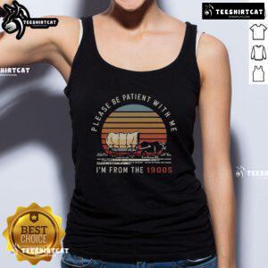 Vintage sunset tank top featuring an oxen wagon with 'Please be patient, I'm from the 1900s' slogan for a nostalgic vibe.