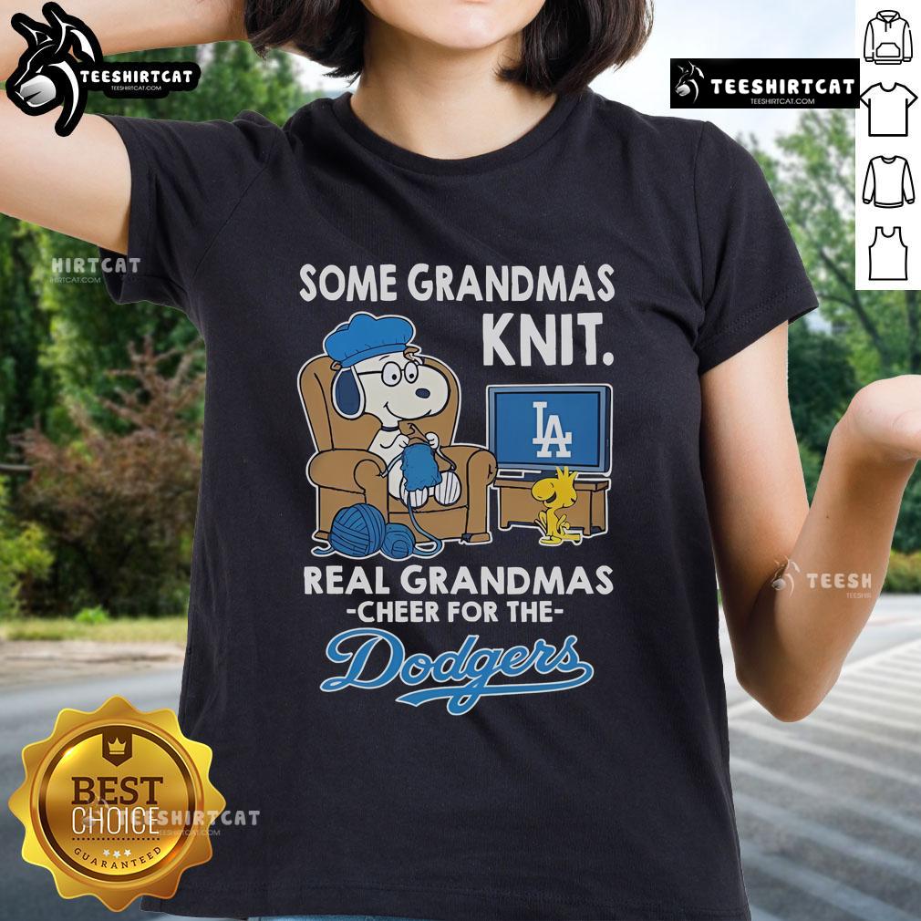 Womens tee featuring Snoopy and Woodstock cheering for the Los Angeles Dodgers, perfect for grandmas and fans alike.