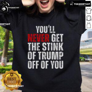 Funny 'You'll Never Get The Stink Of Trump Off Of You' sweatshirt design featuring humorous text and vibrant colors.