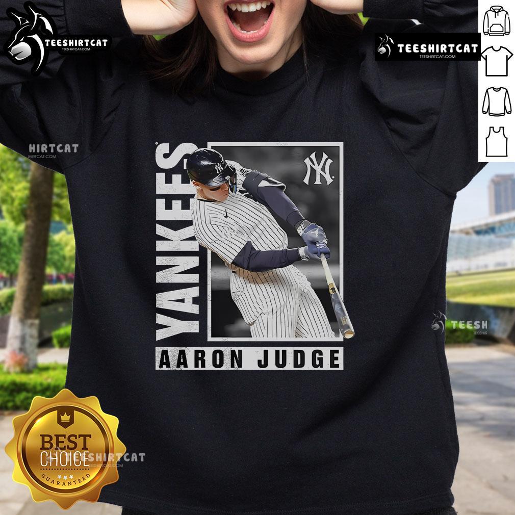 Alt Text: Official Aaron Judge New York Yankees MLB baseball player wearing a stylish sweatshirt during a hot streak.