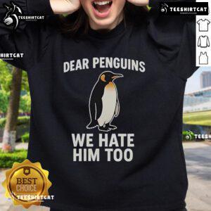 Alt Text: Official Dear Penguins We Hate Him Too Sweatshirt featuring bold text and a stylish design for penguin fans.